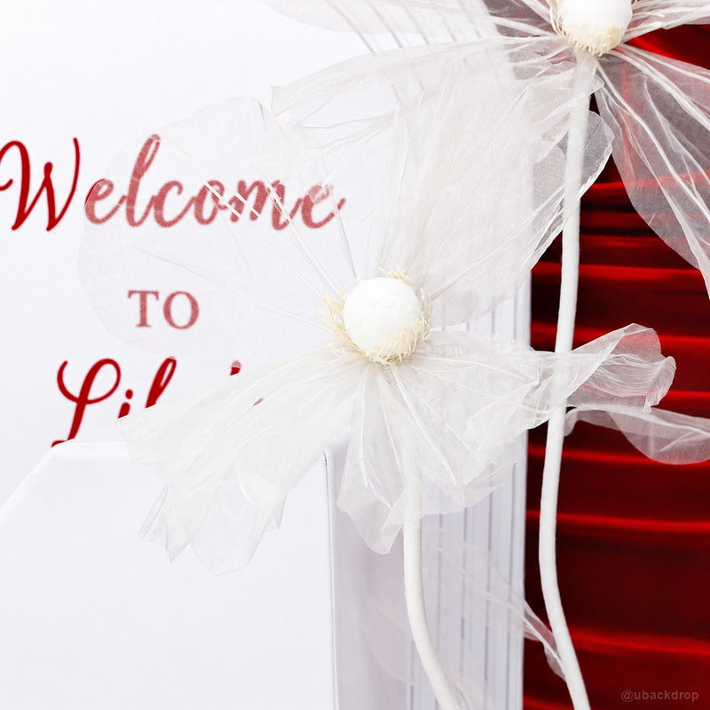 White organza flower detail party stand backdrop decor