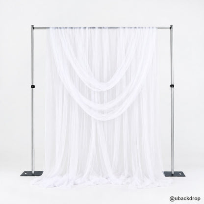 White sheer tulle backdrop stand draped wedding event photo booth decoration