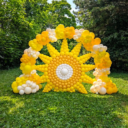 Yellow sun balloon sculpture outdoor summer party photo backdrop